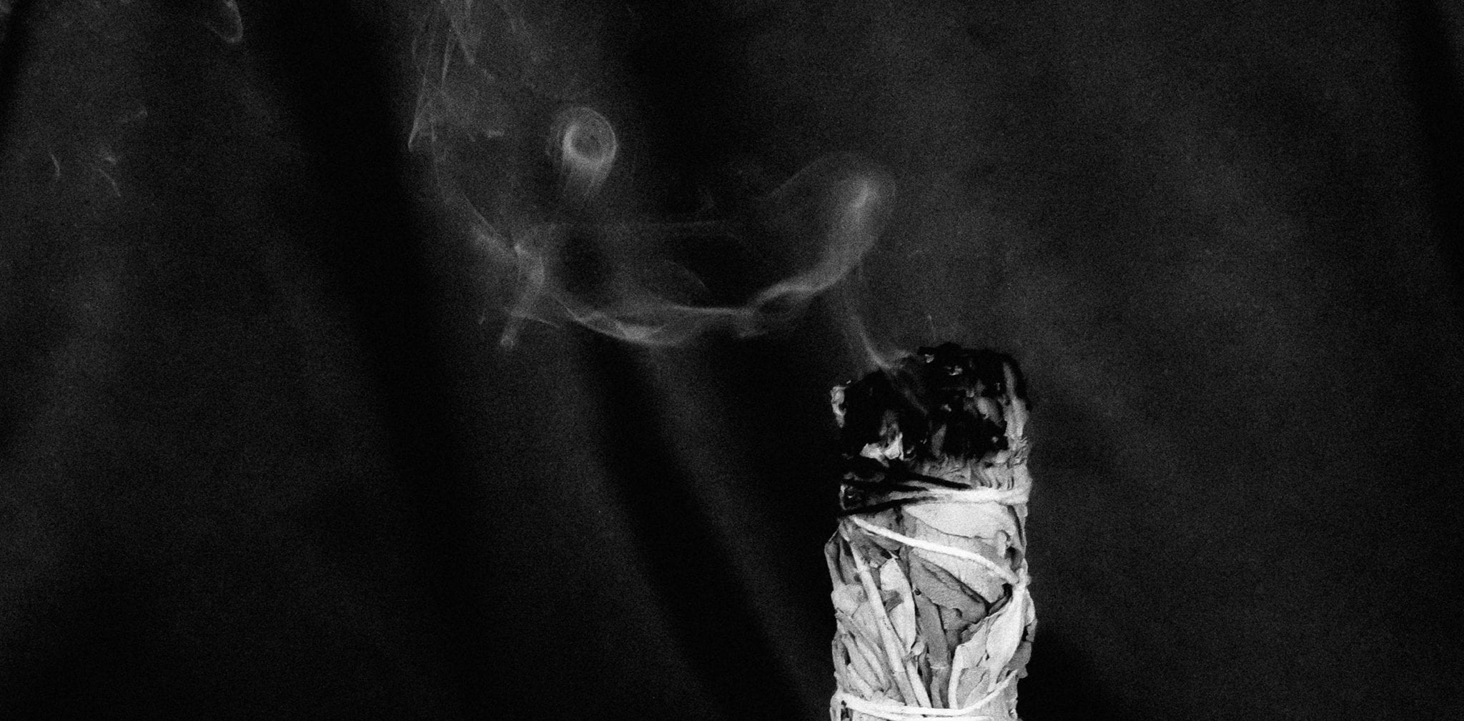 Smudge Stick of White Sage smoking